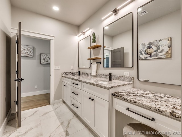 3241 E 171st St S, Bixby, OK 74008 - full bath with marble finish floors, baseboards, double vanity, and recessed lighting