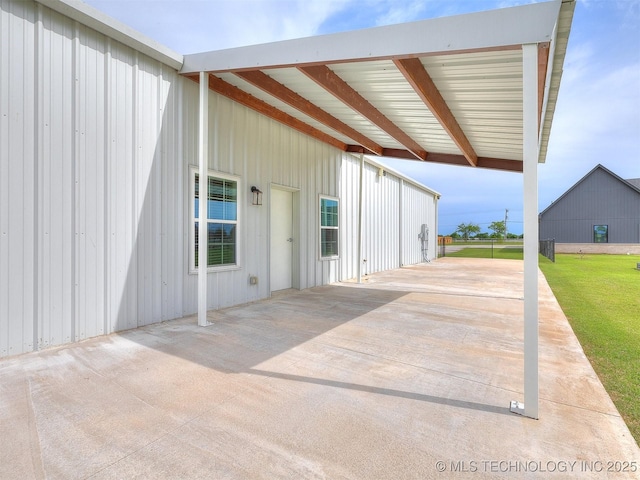 3241 E 171st St S, Bixby, OK 74008 - view of patio with an attached carport and concrete driveway