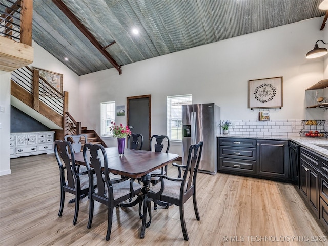 3241 E 171st St S, Bixby, OK 74008 - dining room with light wood-style flooring, high vaulted ceiling, stairway, beam ceiling, and recessed lighting