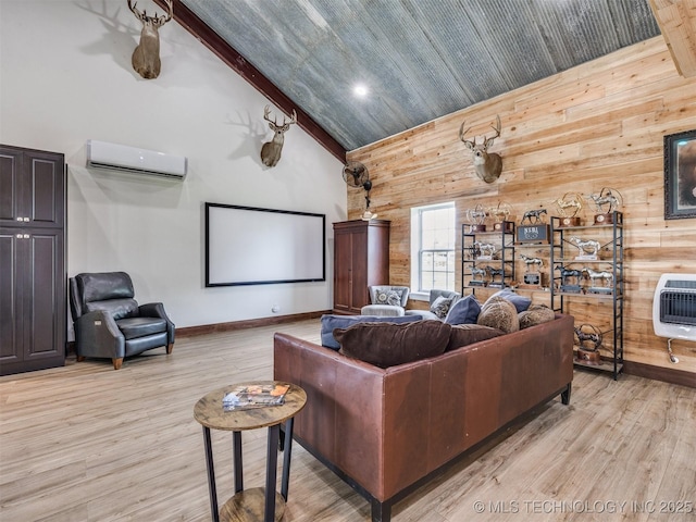 3241 E 171st St S, Bixby, OK 74008 - home theater room with a wall mounted air conditioner, heating unit, wood walls, light wood-style floors, and high vaulted ceiling