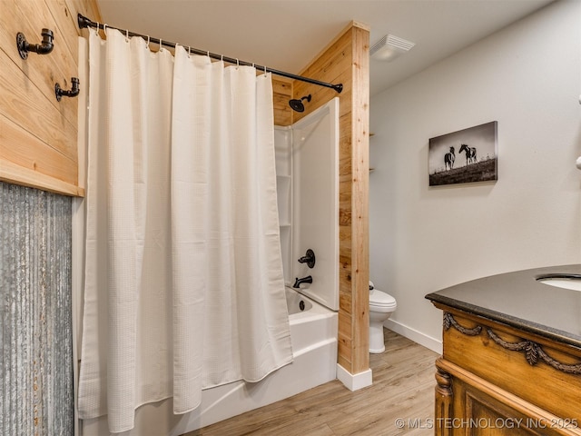3241 E 171st St S, Bixby, OK 74008 - full bathroom with toilet, wood finished floors, shower / bathtub combination with curtain, vanity, and baseboards