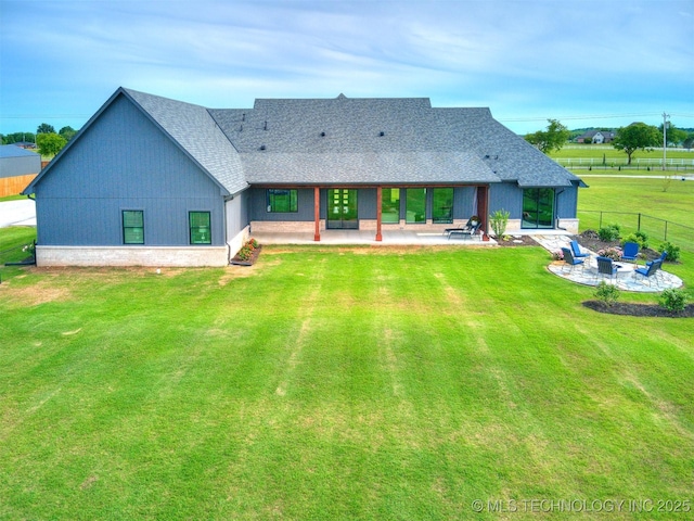 3241 E 171st St S, Bixby, OK 74008 - rear view of property featuring a fire pit, a patio area, and a shingled roof