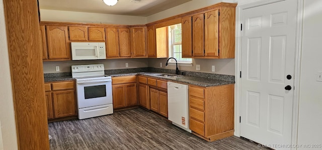 103 E Iola, Sallisaw, OK 74955 - kitchen featuring white appliances, a sink, brown cabinetry, and dark wood-type flooring