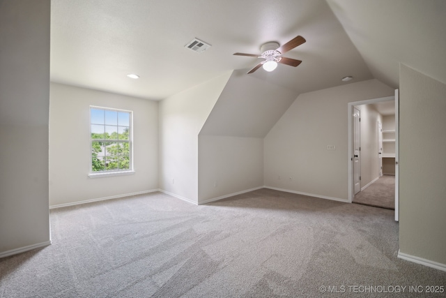 4805 S Mckinley Ave, Sand Springs, OK 74063 - additional living space with carpet, ceiling fan, lofted ceiling, and baseboards