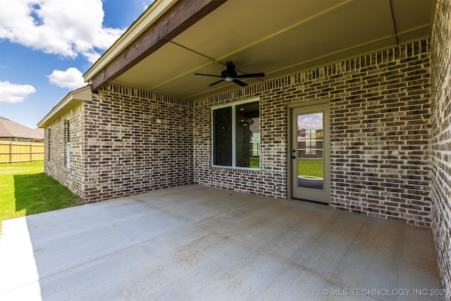 view of patio / terrace featuring a ceiling fan and fence