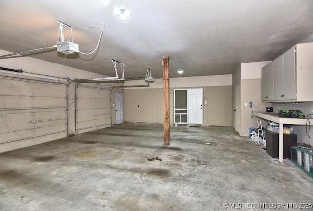 8734 S Richmond Ave, Tulsa, OK 74137 - garage with a garage door opener
