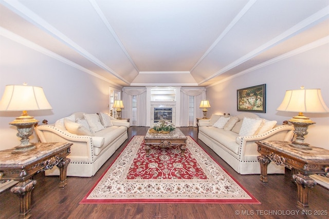 8734 S Richmond Ave, Tulsa, OK 74137 - living area featuring a raised ceiling, wood finished floors, and ornamental molding
