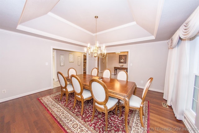 8734 S Richmond Ave, Tulsa, OK 74137 - dining space featuring a tray ceiling, a chandelier, wood finished floors, baseboards, and ornamental molding