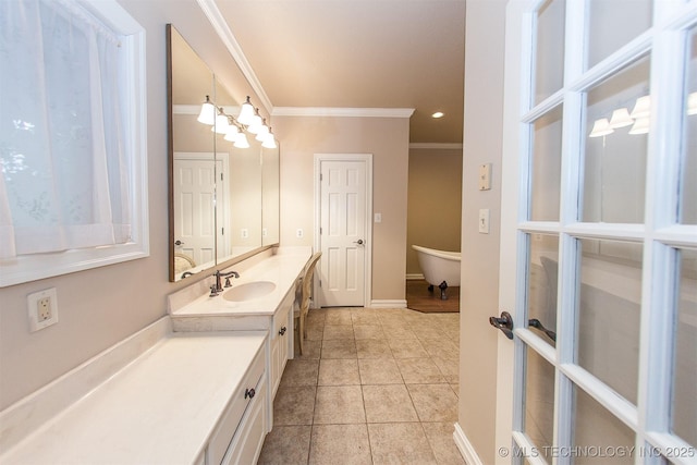 8734 S Richmond Ave, Tulsa, OK 74137 - bathroom with vanity, crown molding, tile patterned flooring, baseboards, and recessed lighting