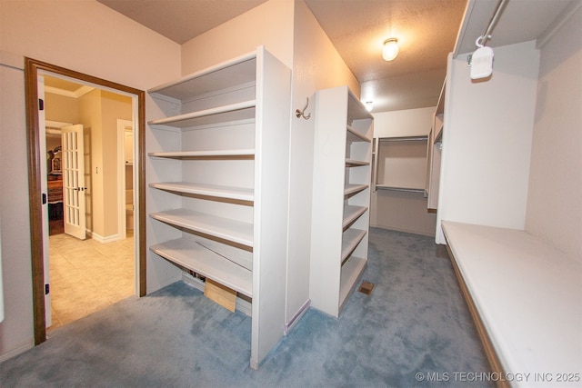 8734 S Richmond Ave, Tulsa, OK 74137 - spacious closet with carpet flooring