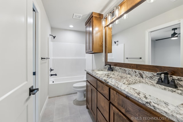 full bathroom with toilet, tile patterned flooring,  shower combination, double vanity, and recessed lighting
