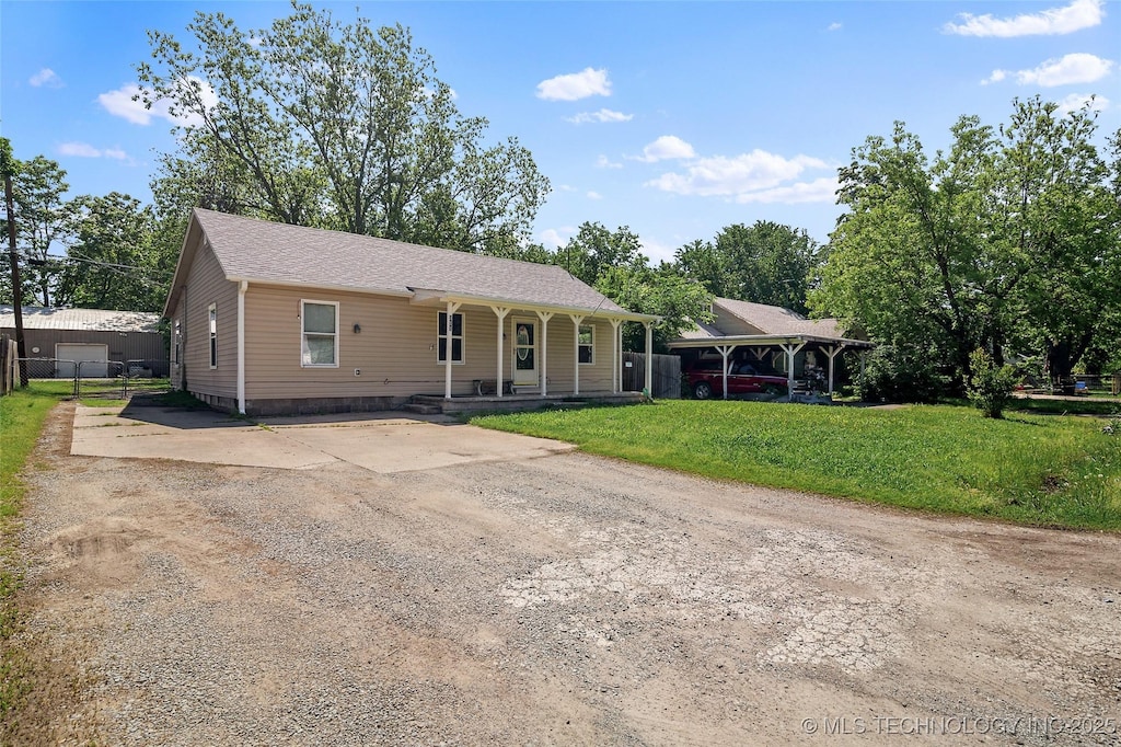 311 N Ora St, Pryor, OK 74361 - ranch-style home featuring concrete driveway and covered porch