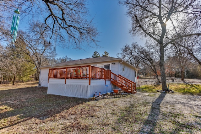 10862 Hide-A-Way, Thackerville, OK 73459 - rear view of property featuring a deck and stairs