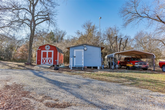 10862 Hide-A-Way, Thackerville, OK 73459 - view of shed with a carport