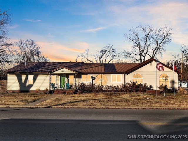 410 W B J Tunnell, Miami, OK 74354 - ranch-style home with metal roof