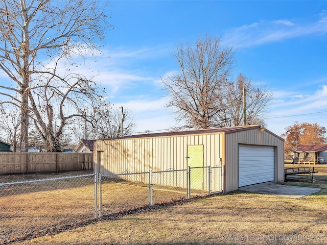 410 W B J Tunnell, Miami, OK 74354 - detached garage featuring fence