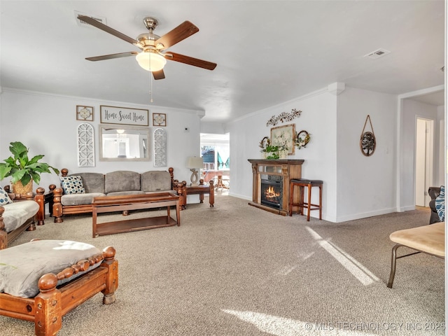 410 W B J Tunnell, Miami, OK 74354 - carpeted living area with ceiling fan, ornamental molding, a lit fireplace, and baseboards