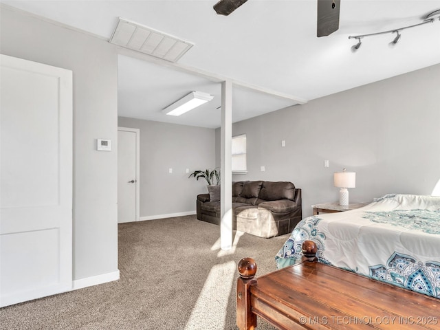 410 W B J Tunnell, Miami, OK 74354 - bedroom with carpet and baseboards