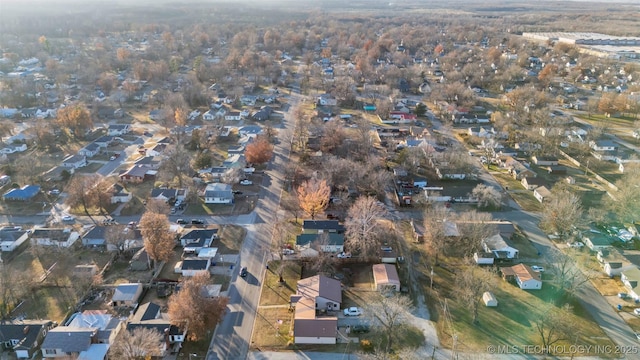410 W B J Tunnell, Miami, OK 74354 - aerial view of property and surrounding area featuring nearby suburban area