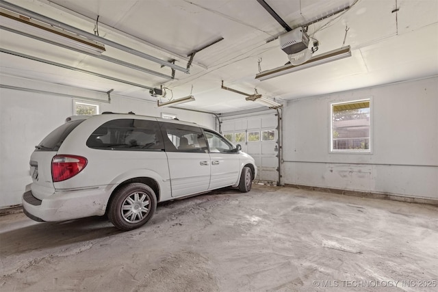 garage featuring a garage door opener