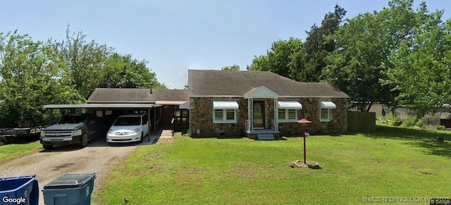 1435 E Oak St, Cushing, OK 74023 - view of front of property with dirt driveway, an attached carport, a front lawn, and stone siding