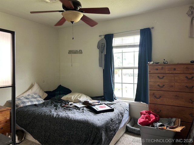 bedroom featuring a ceiling fan