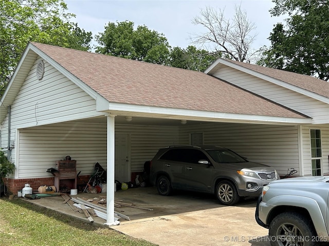 view of parking / parking lot with a carport and driveway