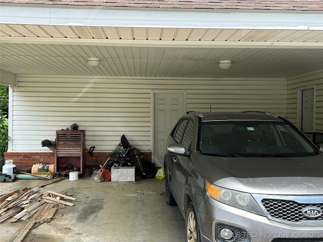 garage featuring a carport
