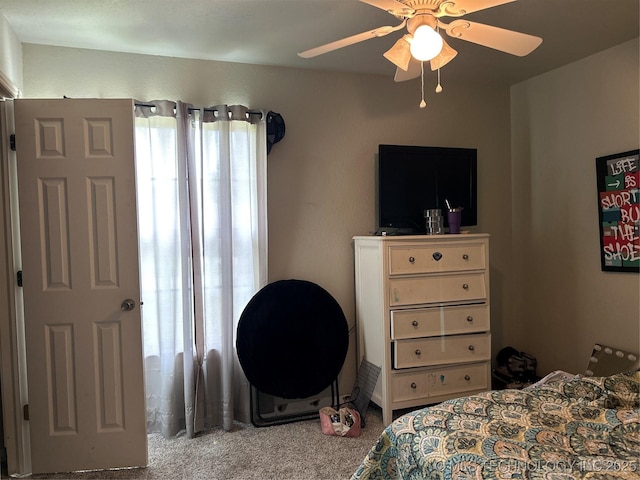 bedroom featuring carpet floors and a ceiling fan