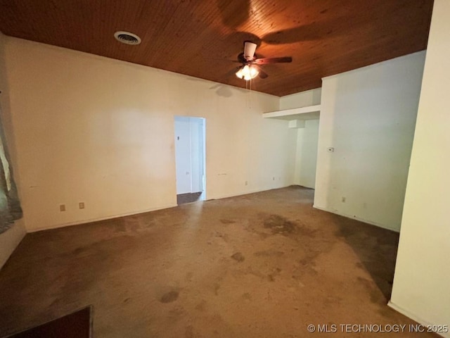303 NW 3rd St, Stigler, OK 74462 - empty room with wooden ceiling and a ceiling fan