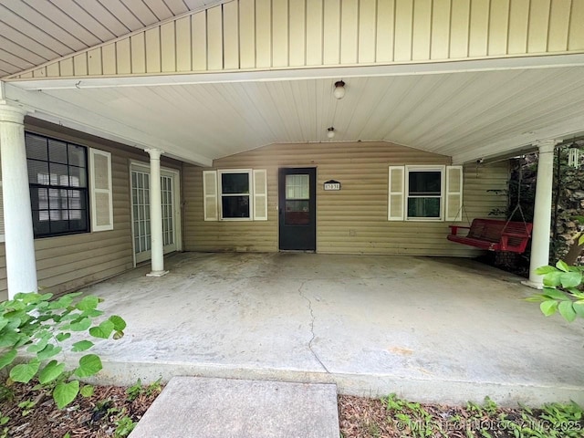 303 NW 3rd St, Stigler, OK 74462 - view of patio / terrace featuring a carport