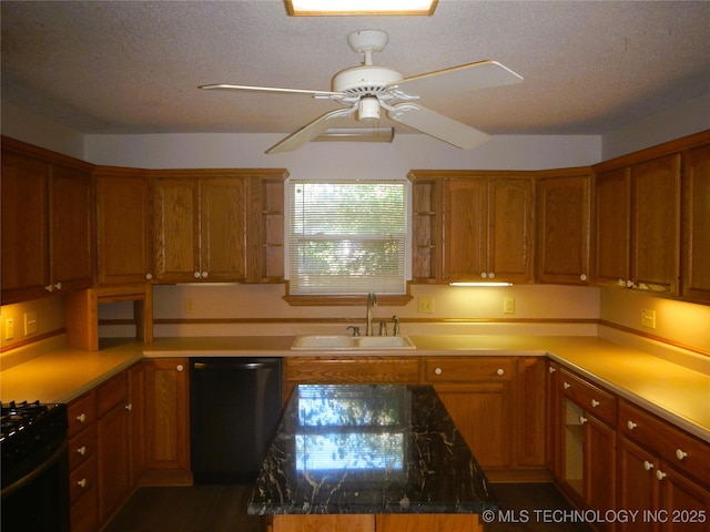 110 W 8th St, So Coffeyville, OK 74072 - kitchen featuring a sink, dishwashing machine, brown cabinets, and a textured ceiling
