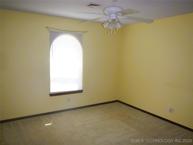 110 W 8th St, So Coffeyville, OK 74072 - unfurnished room featuring ceiling fan, carpet floors, and baseboards