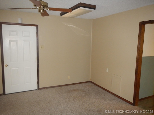 110 W 8th St, So Coffeyville, OK 74072 - empty room with a ceiling fan, light carpet, and baseboards