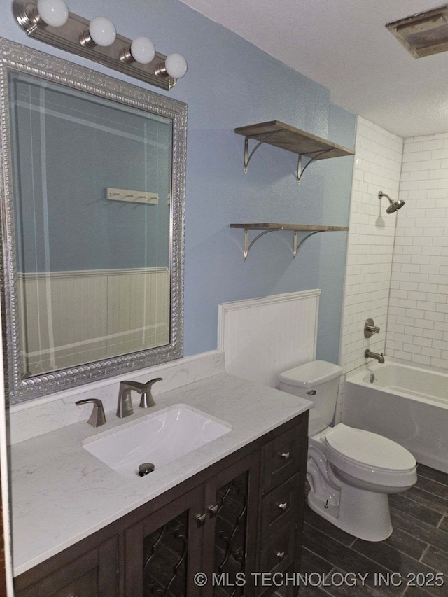110 W 8th St, So Coffeyville, OK 74072 - full bathroom with vanity, toilet, and tub / shower combination