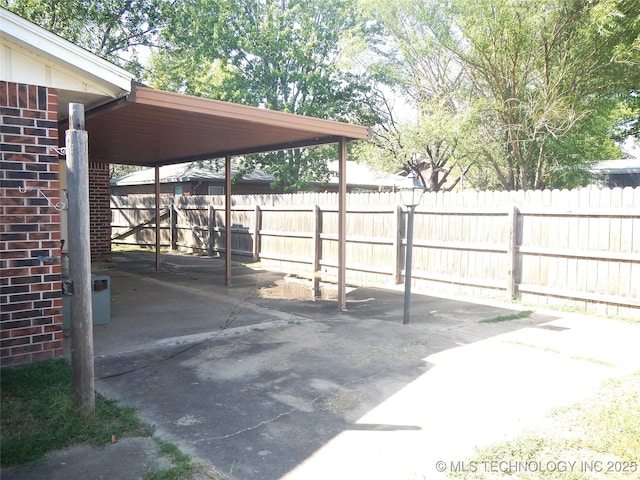 110 W 8th St, So Coffeyville, OK 74072 - view of patio / terrace with fence