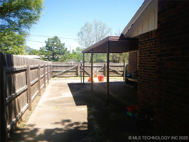 110 W 8th St, So Coffeyville, OK 74072 - view of patio featuring a fenced backyard