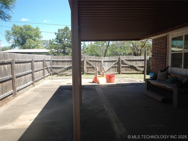 110 W 8th St, So Coffeyville, OK 74072 - view of patio featuring a fenced backyard