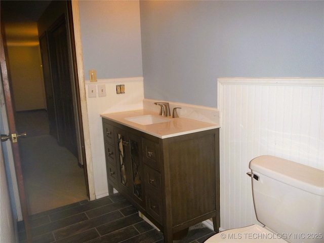 110 W 8th St, So Coffeyville, OK 74072 - bathroom featuring toilet and vanity