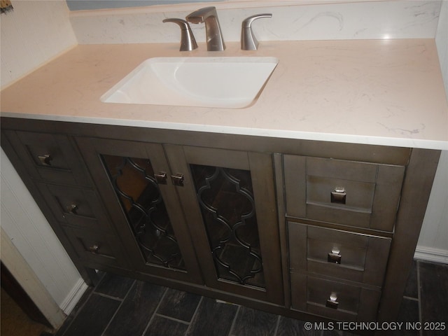 110 W 8th St, So Coffeyville, OK 74072 - bathroom view of wood finished floors and vanity