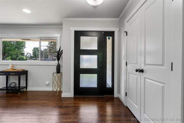 3478 S Gary Ave, Tulsa, OK 74105 - foyer entrance featuring wood finished floors, crown molding, baseboards, and recessed lighting