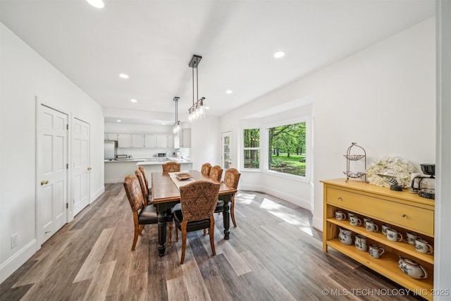 1001 County Road 2265, Skiatook, OK 74070 - dining area featuring baseboards, wood finished floors, and recessed lighting