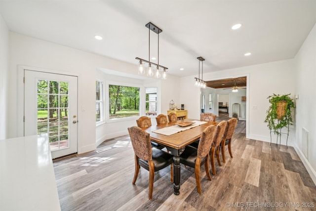 1001 County Road 2265, Skiatook, OK 74070 - dining area with wood finished floors, baseboards, recessed lighting, and a ceiling fan