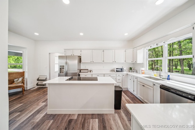 1001 County Road 2265, Skiatook, OK 74070 - kitchen with stainless steel appliances, a sink, healthy amount of natural light, a kitchen island, and recessed lighting