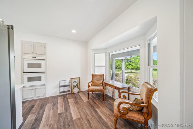 1001 County Road 2265, Skiatook, OK 74070 - living area with wood finished floors, baseboards, and recessed lighting