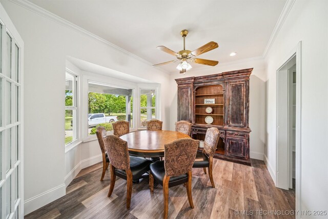 1001 County Road 2265, Skiatook, OK 74070 - dining area featuring baseboards, plenty of natural light, ornamental molding, wood finished floors, and recessed lighting