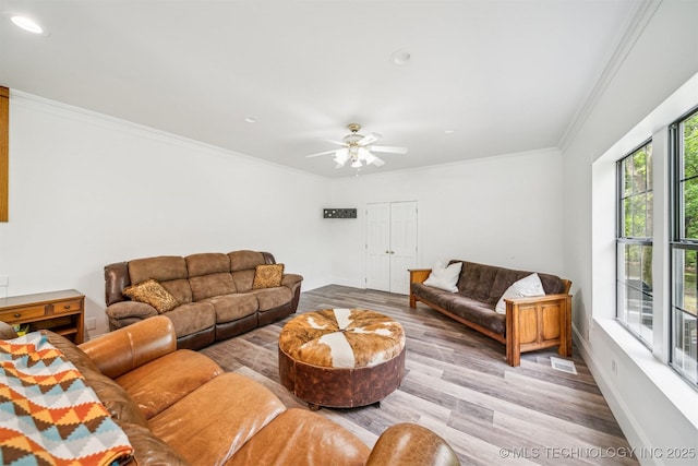1001 County Road 2265, Skiatook, OK 74070 - living area with baseboards, wood finished floors, ornamental molding, ceiling fan, and recessed lighting