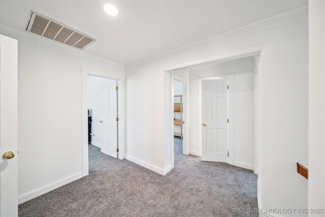 1001 County Road 2265, Skiatook, OK 74070 - empty room featuring carpet flooring, ornamental molding, and baseboards