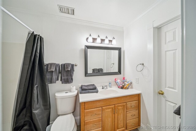 1001 County Road 2265, Skiatook, OK 74070 - full bathroom featuring ornamental molding, vanity, toilet, and curtained shower