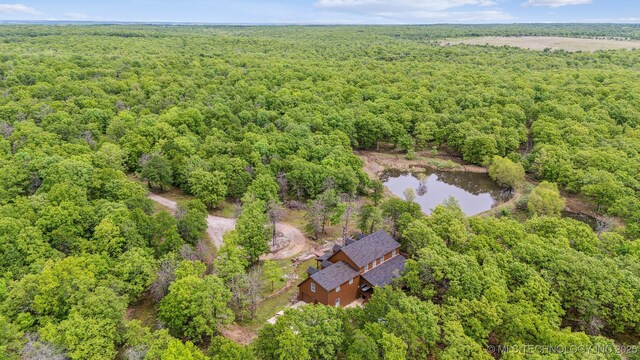 1001 County Road 2265, Skiatook, OK 74070 - aerial view of property's location featuring a forest and a large body of water